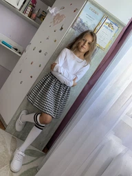 Дитяча шкільна спідниця для дівчинки ТМ Ластівка 23_1008 122 см Чорний/Білий фото від покупців 5