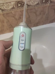 Портативный ирригатор для зубов и полости рта 230 мл Portable Oral Irrigator фото от покупателей 2