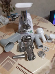 Мясорубка Bosch MFW2517W с насадкой соковыжималкой фото от покупателей 14