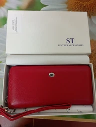 Жіночий клатч-гаманець ST Leather з натуральної шкіри зелений великий вертикальний на блискавці з ремінцем 9х18 5 см 56509