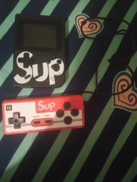 Портативная игровая ретро приставка SUP Game Box + джойсик 400 игр Dendy 8bit SUP Game Box Red (SUP401) фото от покупателей 12