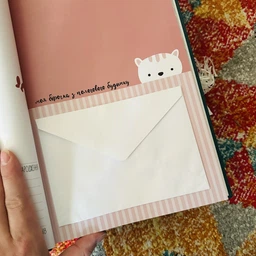 "Baby book" для детских фотографий, первый альбом малыша на украинском, цвет голубой фото от покупателей 12
