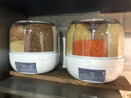 Обертовий контейнер для круп та бобових. Диспенсер для сипучих продуктів фото від покупців 2