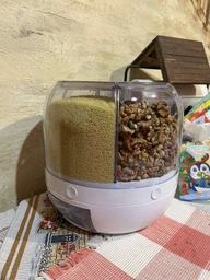 Обертовий контейнер для круп та бобових. Диспенсер для сипучих продуктів фото від покупців 1