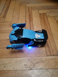 Машинка трансформер на радіокеруванні AToys Bugatti-Robot 1:18 світлові ефекти Чорно-блакитна фото від покупців 6