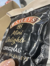 Шоколадные конфеты драже с начинкой Irish cream Baileys 102 гр фото от покупателей 1
