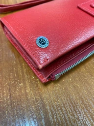 Женский вертикальный кошелек из натуральной кожи на хлястике с кнопкой ST Leather Красный (bg192fash81) фото от покупателей 1