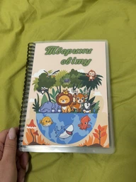 Развивающий ламинированный альбом - книга с играми на липучках "Тварини світу" фото от покупателей 3