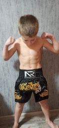 Шорти для тайского боксу та кікбоксингу Another Boxing розмір M, ріст 150-165 см, чорні з золотим (TSH-04-M) фото от покупателей 1