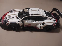 Конструктор машинка технік Porsche 911 RSR Racing Vesion Technology на 1630 деталей в масштабі 1:10 Порше авто гоночна версія фото від покупців 16