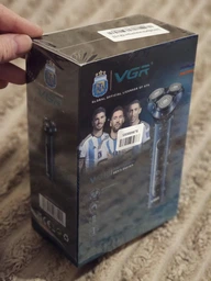 Мужская аккумуляторная электробритва VGR V-310 для влажного и сухого бритья с тремя плавающими головками IPX7 фото от покупателей 1