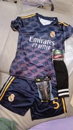 Комплект футбольна форма дитяча Lion SPORT Real Madrid BELLINGHAM (Реал Мадрид Белінгем) з гетрами (розмір 34-38) та щитками, розмір 24 розмір, ріст 130-140 см, чорний з помаранчевим фото от покупателей 1