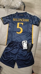 Комплект футбольна форма дитяча Lion SPORT Real Madrid BELLINGHAM (Реал Мадрид Белінгем) з гетрами (розмір 34-38) та щитками, розмір 24 розмір, ріст 130-140 см, чорний з помаранчевим