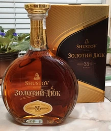 Коньяк Шустов Золотой Дюк 35 0.7 л 40% в подарочной упаковке (4820000947756) фото от покупателей 6