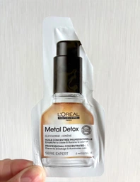 Профессиональное масло L'Oreal Professionnel Serie Expert Metal Detox для уменьшения ломкости всех типов волос и нежелательного изменения цвета 50 мл (3474637090609) фото от покупателей 5