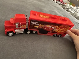 Трейлер Мак Cars Тачки. Автовоз Маквіна. Вантажівка транспортер Cars Lightning McQueen Mack Truck фото от покупателей 4