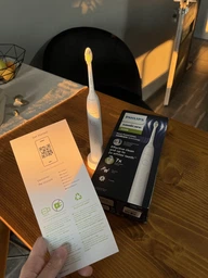 Электрическая зубная щетка Philips Sonicare HX7110/01 серии 5500 фото от покупателей 9