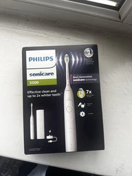Электрическая зубная щетка PHILIPS Sonicare HX7110/02 серии 5500 фото от покупателей 15