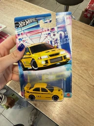 Тематическая Машинка Hot Wheels Mitsubishi Mitsubishi Lancer Evolution VI '90s Street Scene 1:64 JCB58 GDG44 Yellow