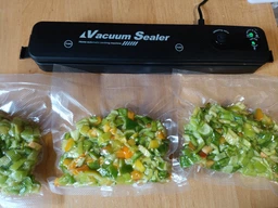 Вакууматор для продуктів машина для вакуумування та зварювання пакетів Vacuum Sealer