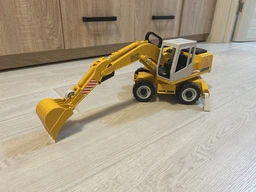 Игрушка Bruder Экскаватор колёсный Liebherr М1:16 (02426) фото от покупателей 1
