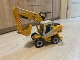 Игрушка Bruder Экскаватор колёсный Liebherr М1:16 (02426)