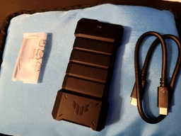 Зовнішня кишеня Asus TUF Gaming A2 M.2 NVMe (PCIe) SSD Enclosure USB 3.2 Gen2x2 Type-C (ESD-T1W) (90DD02X0-M09000) фото від покупців 9