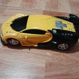 Машинка трансформер Bugatti на радіокеруванні зі світловими ефектами (червона) фото від покупців 7