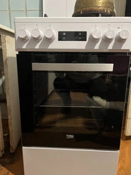Комбінована плита з чавунними решітками Beko FSE52332DWDS
