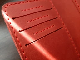 Компактний шкіряний гаманець потрійного складання червоний K101-580 фото від покупців 2