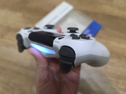 Бездротовий геймпад для PlayStation/PC Dualshock 4 V2 Sunset Orange фото від покупців 3