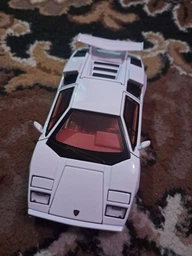 Металлическая модель Lamborghini Countach LP 1:32 со светом и звуком Инерционная машинка в коробке спортивная коллекционная модель фото от покупателей 2