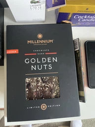 Шоколад черный с фундуком,миндалем и клюквой 1,1 кг Millennium