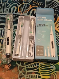 Электрическая ультразвуковая зубная щетка скалер Electric Teeth Cleaner для удаления камней отбеливание зубов белая фото от покупателей 15