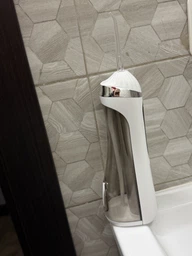 Ирригатор для полости рта 200 мл беспроводной аккумуляторный Oral Irrigator, портативный с 3 режимами работы и 4 сменными насадками для ухода за зубами, деснами и брекетами Белый, RGL-137-White фото от покупателей 2