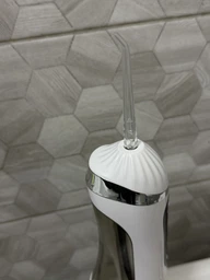 Ирригатор для полости рта 200 мл беспроводной аккумуляторный Oral Irrigator, портативный с 3 режимами работы и 4 сменными насадками для ухода за зубами, деснами и брекетами Белый, RGL-137-White фото от покупателей 1