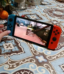Портативна ігрова приставка Nintendo Switch OLED with Neon Blue and Neon Red Joy-Con (045496453442)