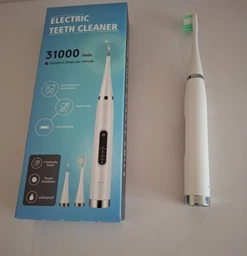 Электрическая ультразвуковая зубная щетка скалер Electric Teeth Cleaner для удаления камней отбеливание зубов белая фото от покупателей 5