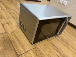 Мікрохвильова піч 25л, 800Вт, дисплей, відкрю ручкою, білий Panasonic 000330015 фото від покупців 9