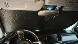Солнцезащитная шторка на стекло лобовое автомобиля 130х77см фото от покупателей 1