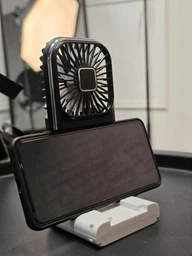Вентилятор міні портативний акумуляторний з павербанком 3000 mAh з підставкою для телефона ручний на шию з USB білий + чорний фото від покупців 19