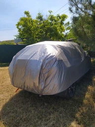 Чехол-тент для автомобиля всесезонный от солнца и снега, размер XL (495×190×150 см), защитная накидка на авто (серый) фото от покупателей 5