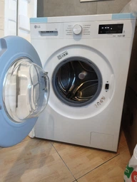 Пральна машина LG фронтальна, 6кг, 1200, В, 44см, дисплей, пара, інвертор, білий фото від покупців 2
