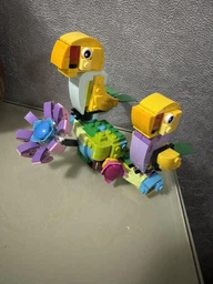 Конструктор LEGO Creator Цветы в лейке 420 деталей (31149)