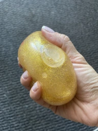 Антистрес сквіш пельмень Mystery Dumpling з глітером 8.5 см у коробочці 10 см | Сквіш Хінкаль в булочці Бао
