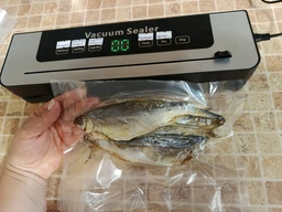 Вакууматор для продуктів 120W із запайкою для дому 10 пакетів фото від покупців 5