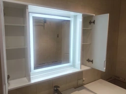 Зеркальный шкаф ШК28 с LED подсветкой 1000х700х160 мм фото от покупателей 1