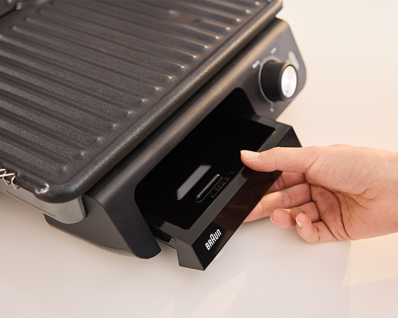 Знімний контейнер для жиру.