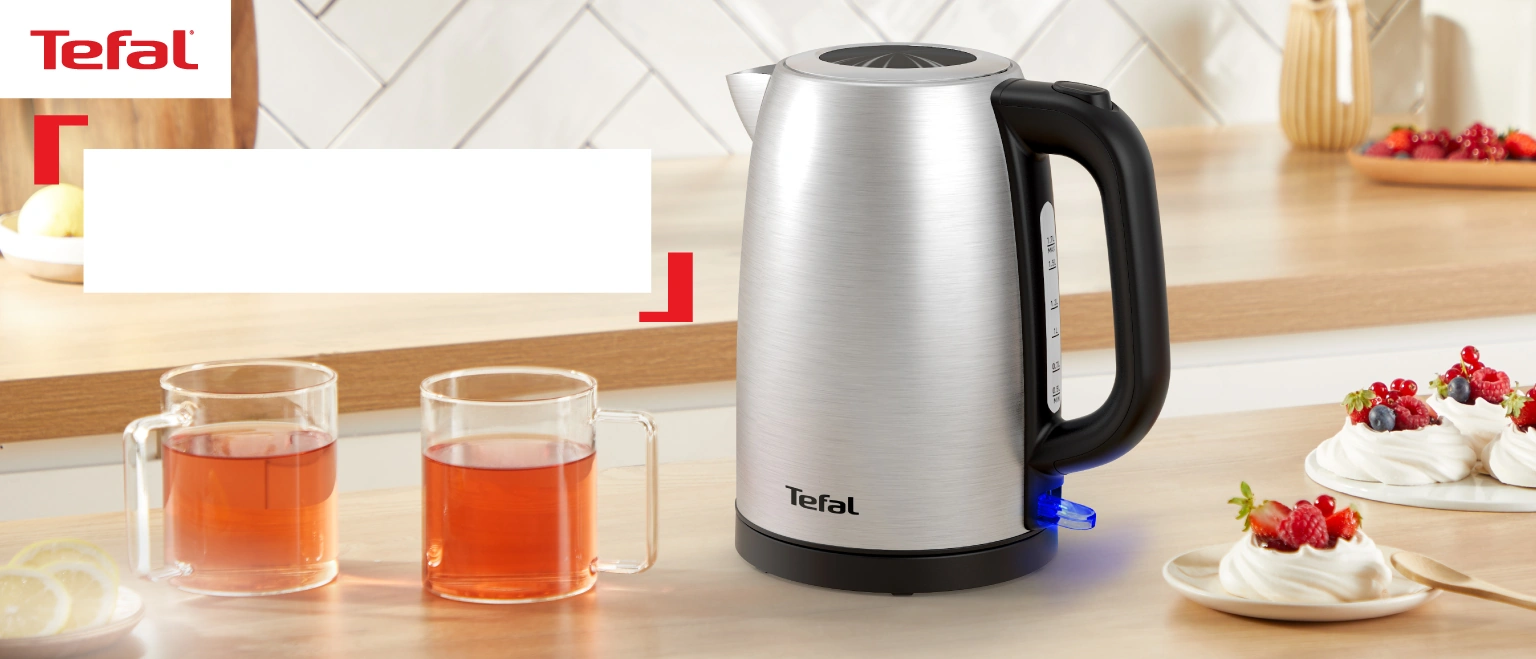 Электрочайник Tefal Stainless Steel Kettle KI1R0DE0 из нержавеющей стали на кухонной столешнице