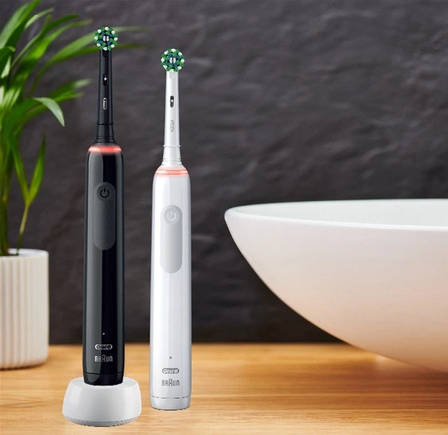 Zestaw elektrycznych szczoteczek Oral-B Pro3 3900 CrossAction Black+White - obraz 8
